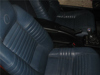 Picture of armrest between seats, black