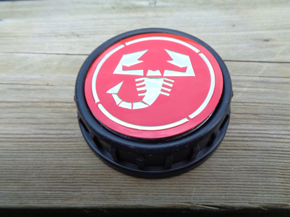 Picture of fuel filler cap with ABARTH emblem, red