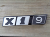 Picture of X 1.9 emblem 1300, decklid trunk