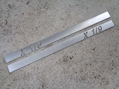 Picture of doorsills, stainless steel, with X 1/9 logo