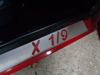 Picture of doorsills, stainless steel, with X 1/9 logo